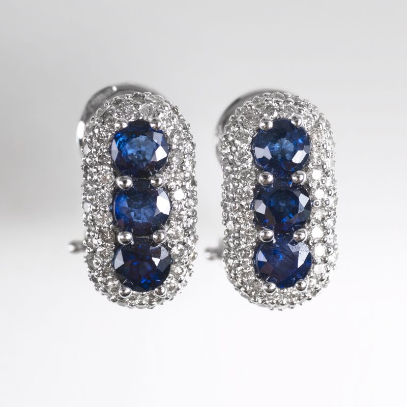 A pair of sapphired diamond earrings