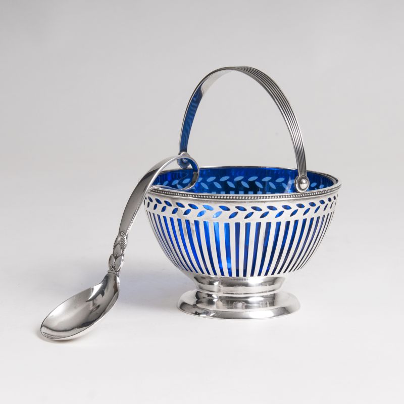 A breakthrough bowl with handle and additional ladle by Georg Jensen