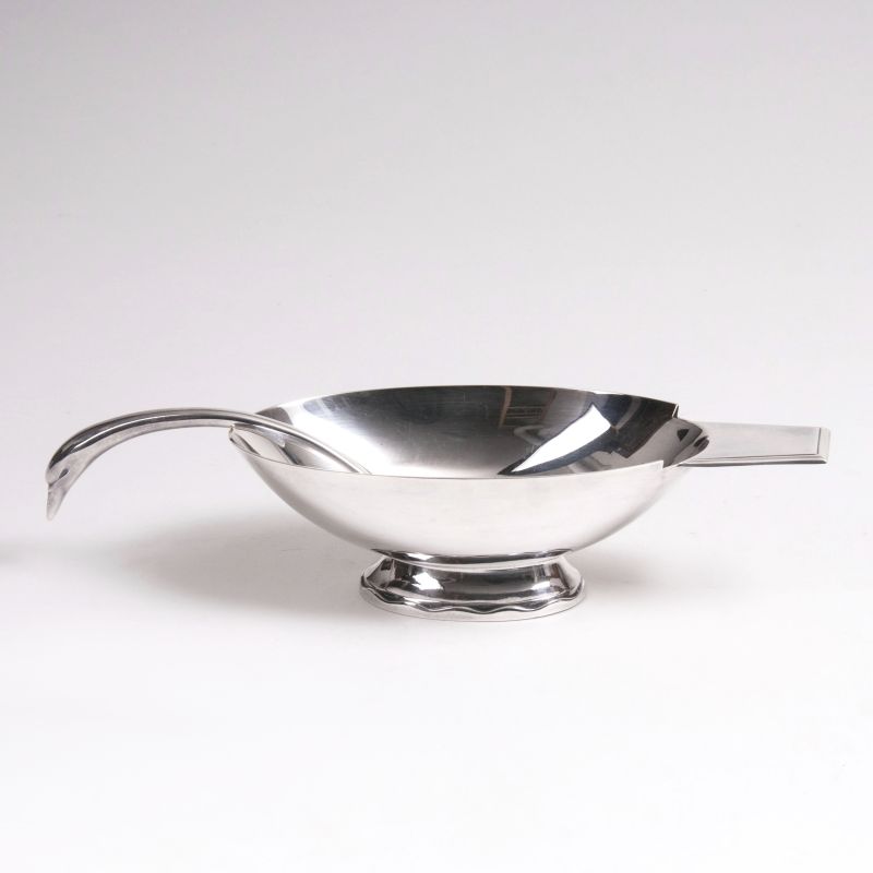 An elegant saucier with a swan head spoon - image 2