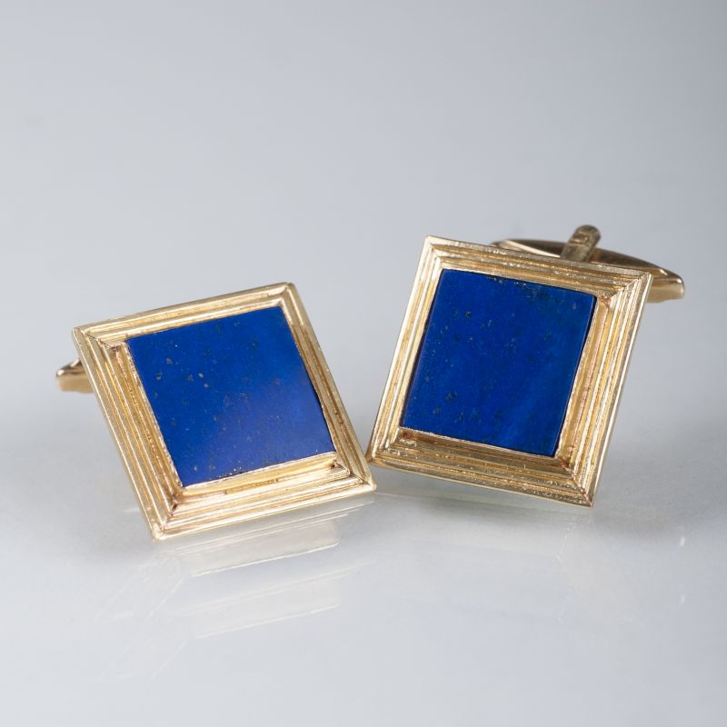 A pair of cufflinks with lapis lazuli