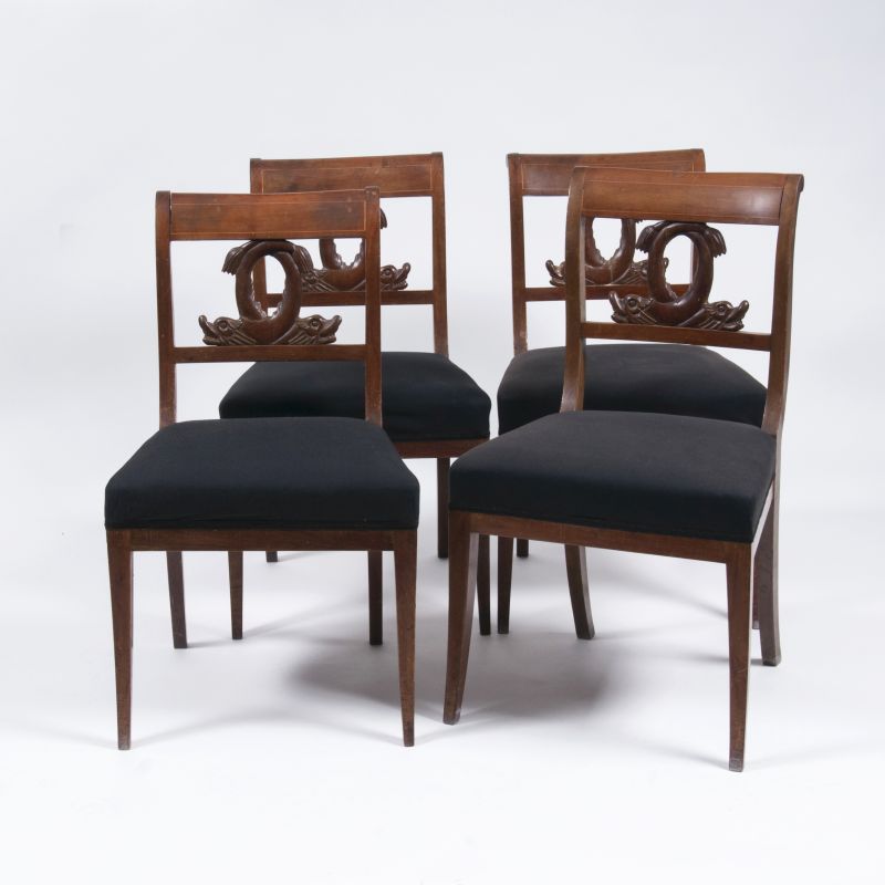 A set of 4 Biedermeier chairs with rare dolphin motive