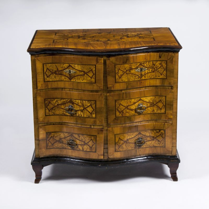 A Baroque commode with strapwork inlays