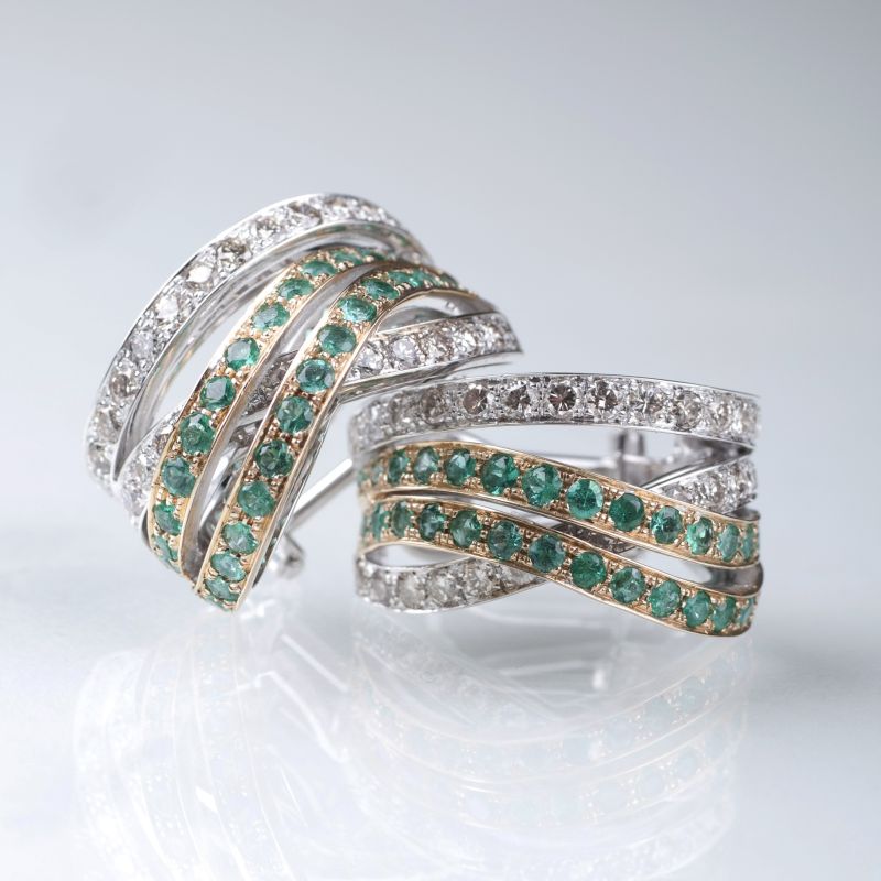 A pair of emerald diamond earrings