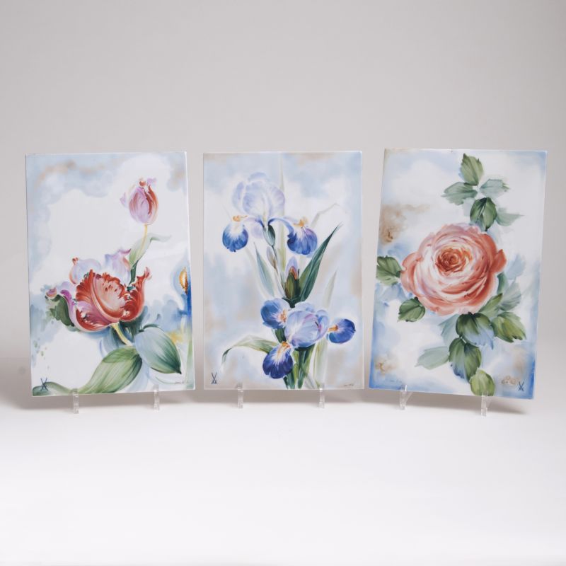 A Set of Three Porcelain Plaques with Flowers