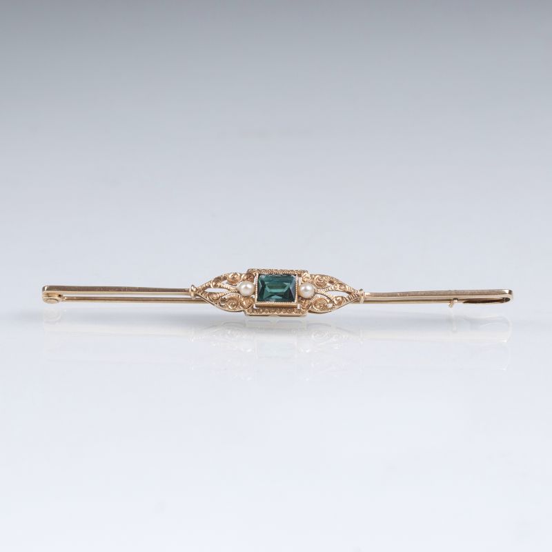 A needle brooch with pearls and tourmaline