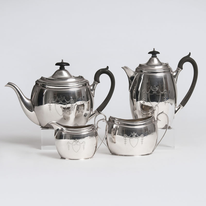 An English Coffee and Tea Set with Fine Engraving