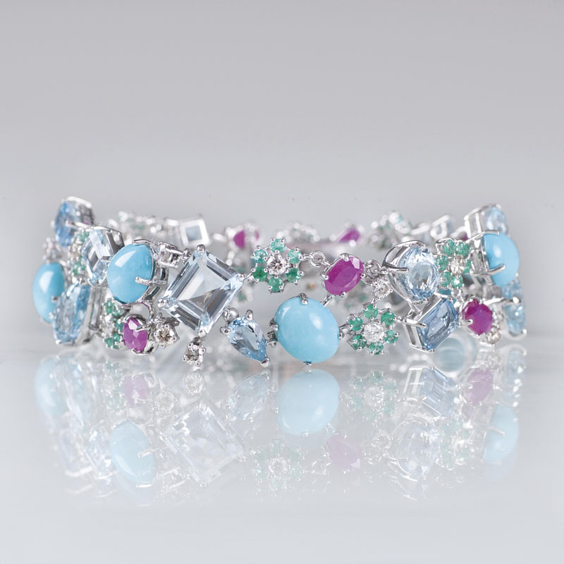 A colourful bracelet with precious stones and flower ornaments