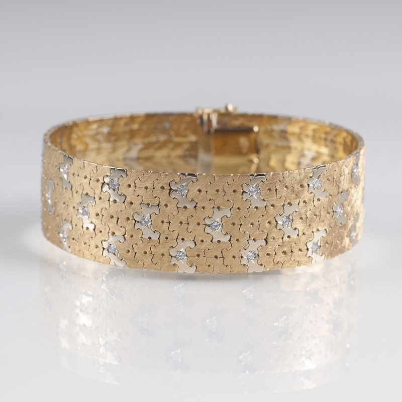 A two coloured Vintage gold bracelet with diamonds