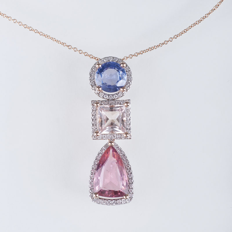A fine precious stone pendant with morganit, tanzanite and pink tourmaline