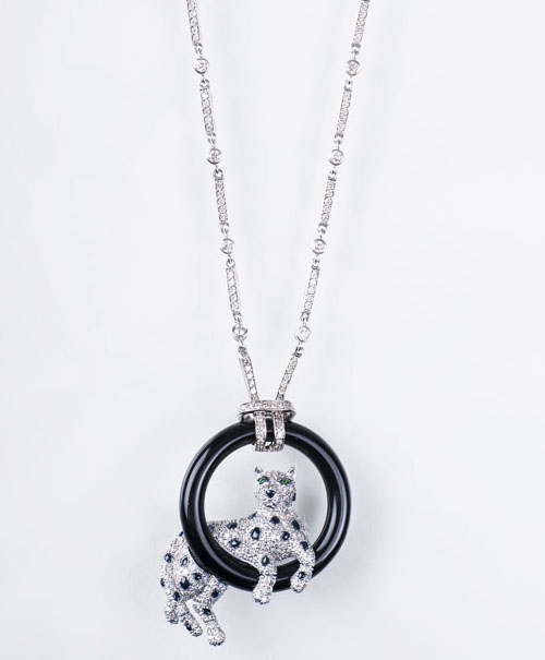 An extraordinary pendant 'Panther' with diamonds and onyx