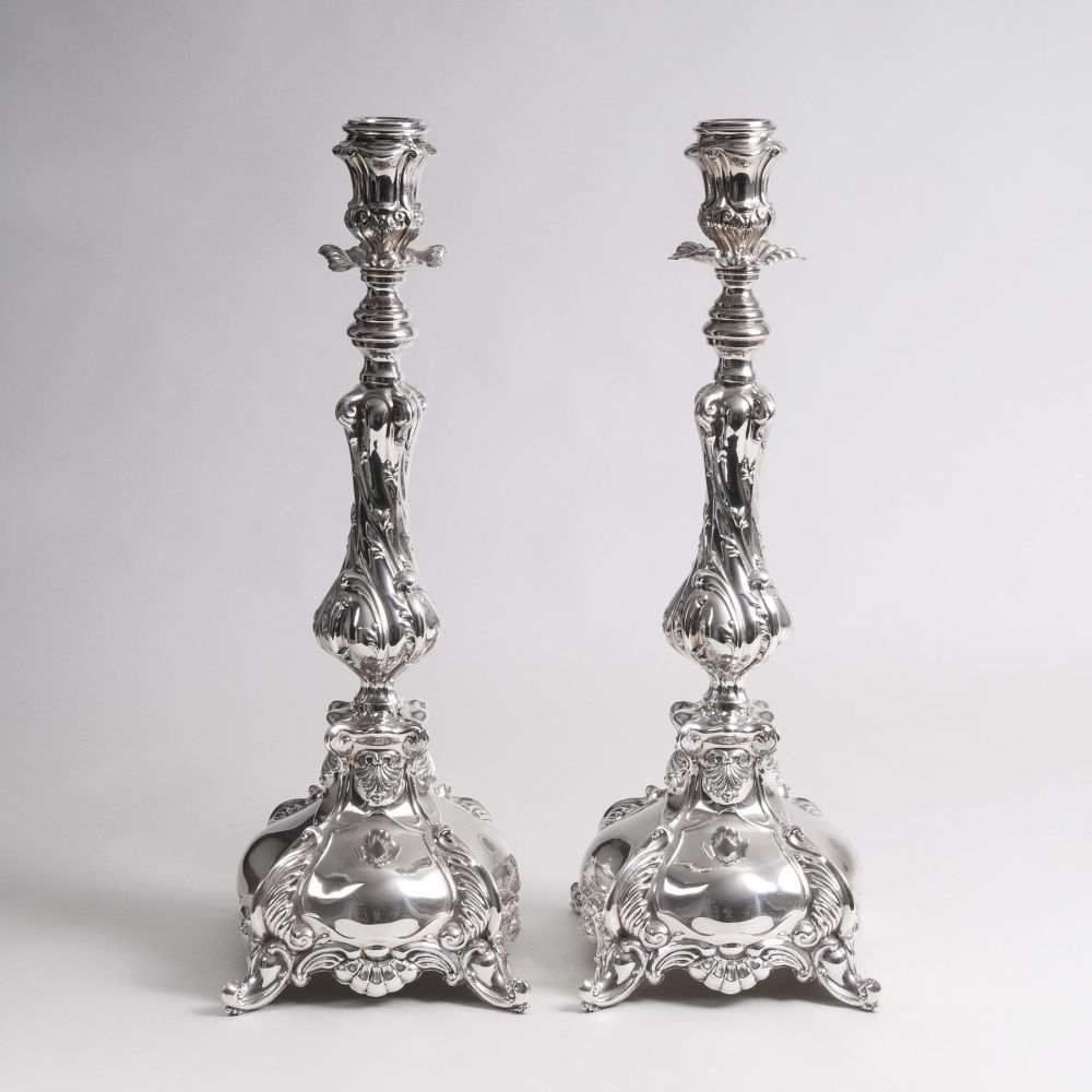 A pair of very large pomp candelabra in a baroque style