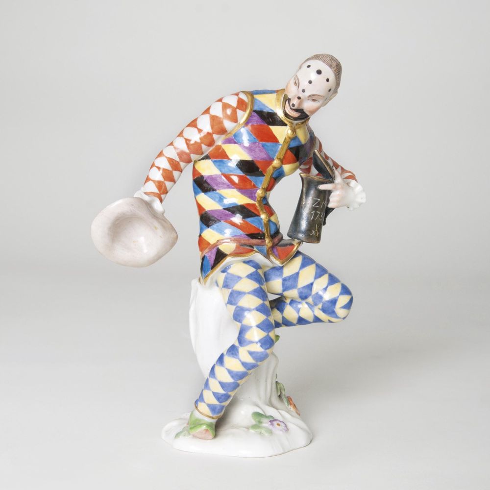 A Figure 'Harlequin with a Lidded Jug'