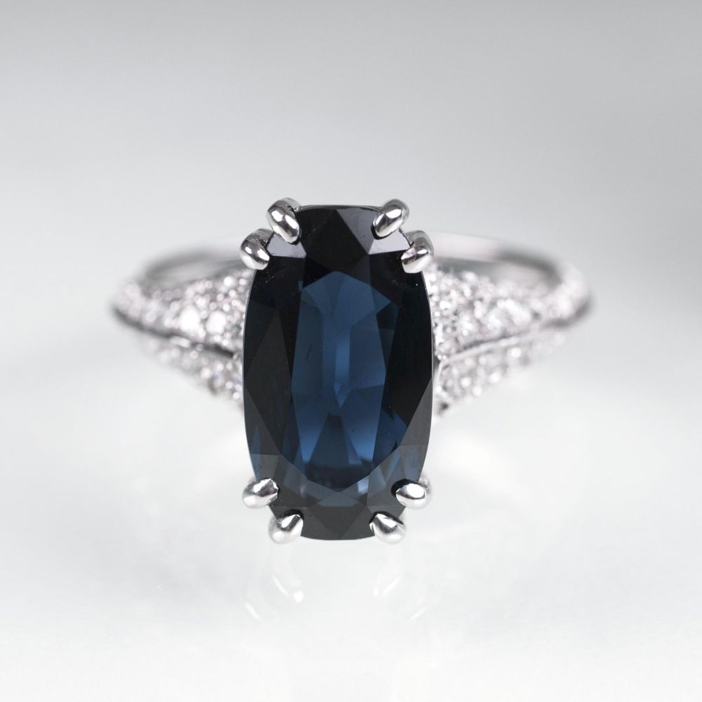 A Ring with Natural Sapphire and Diamonds