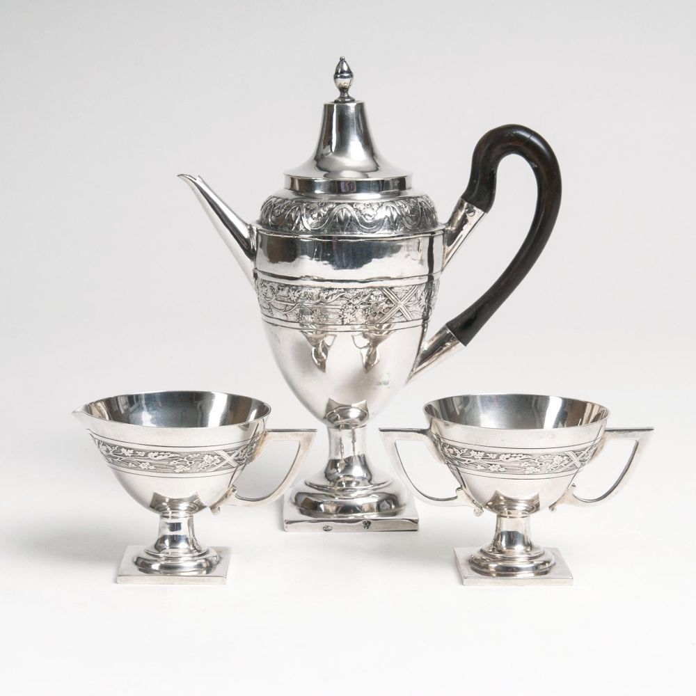An Augsburg Empire-Coffee Set with a Vine Branch Decor