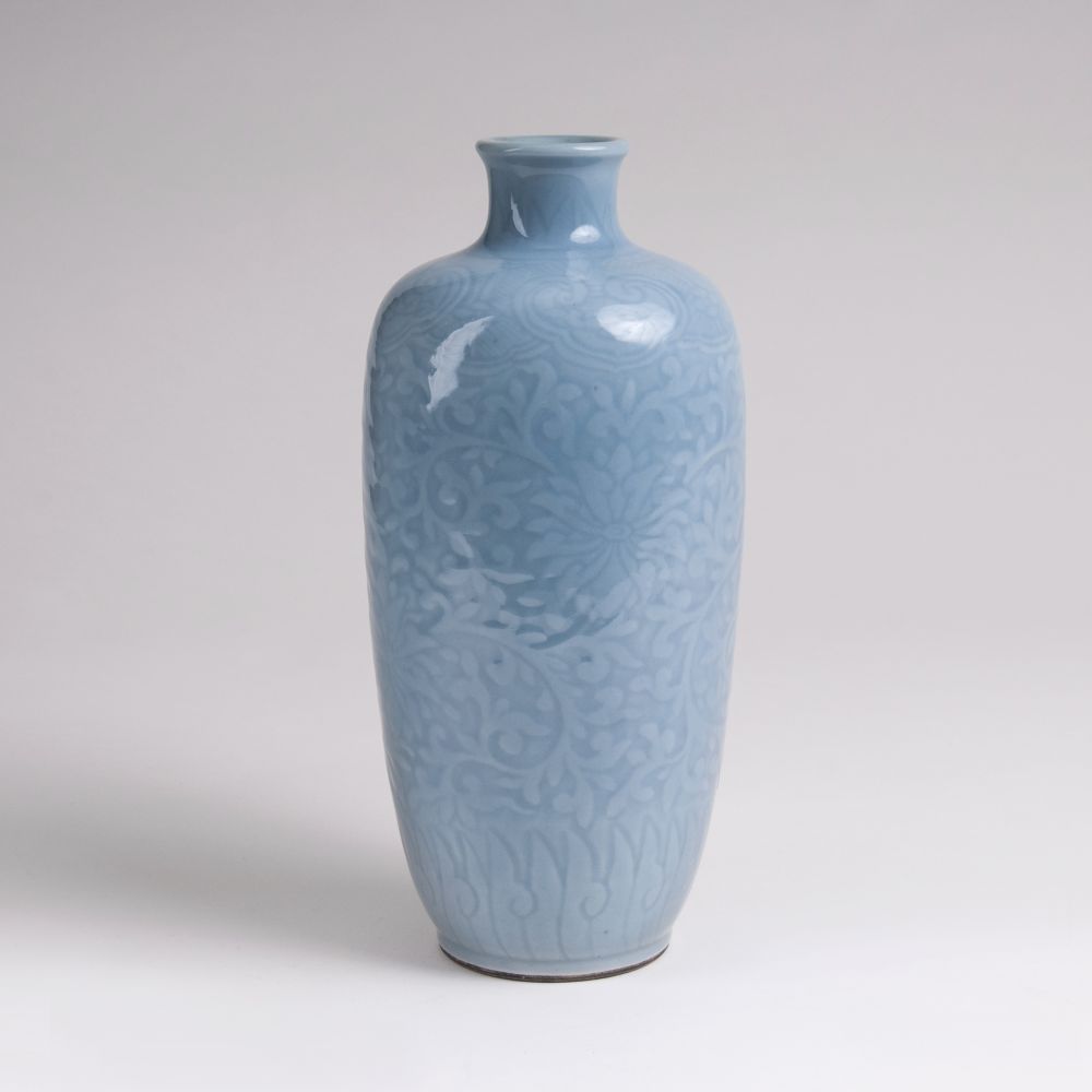 A Clair de Lune Vase with Carved Flower Design