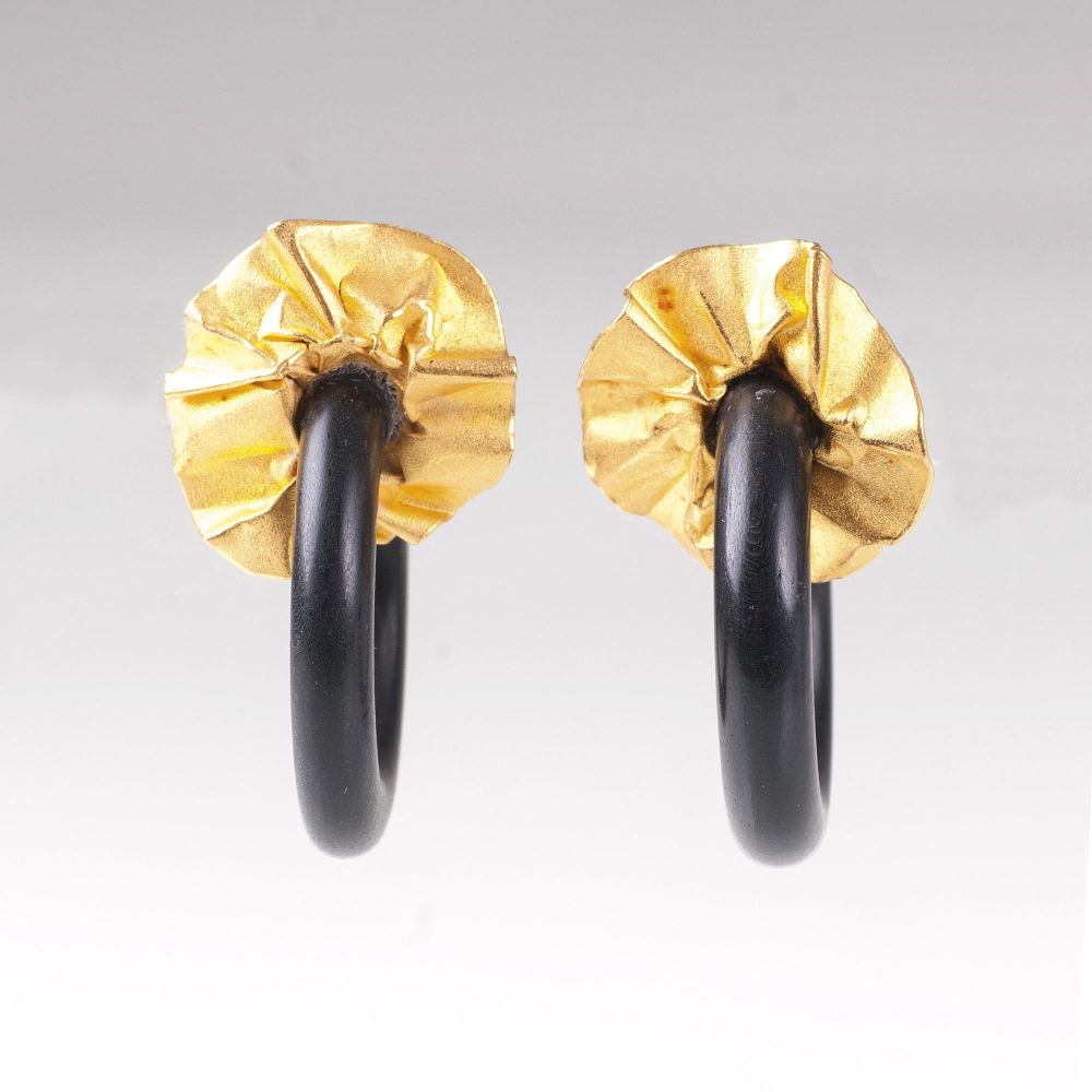 A Pair of Wood Earrings with Gold Mounting