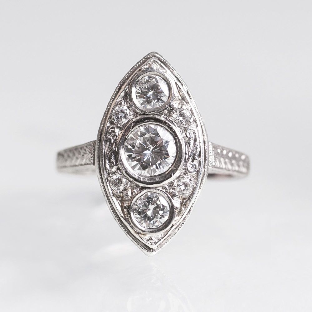 An Art-déco Platinum Ring with Diamonds