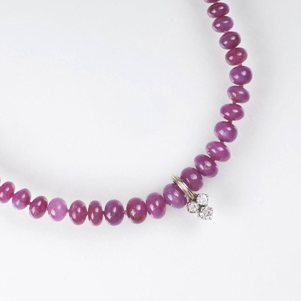 A Ruby Necklace with small Diamond Clip