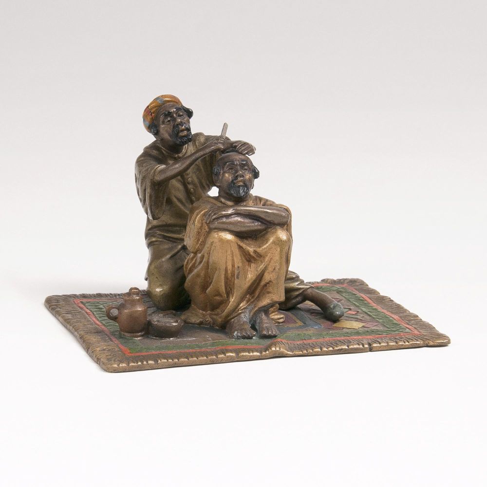 A Vienna Bronze 'At the barber'