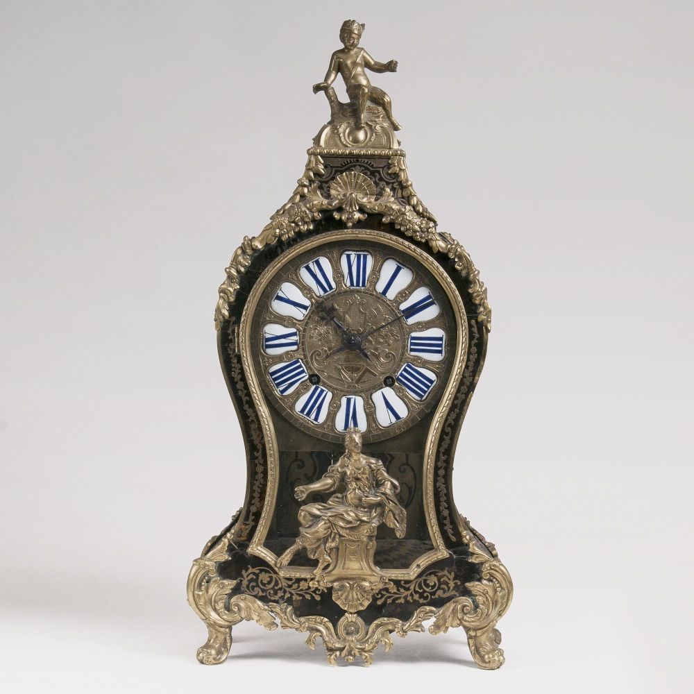 An early Napoleon III Pendule with an allegorical Scene and Satyr figure