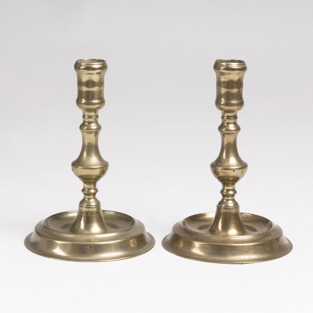 A Pair of Baroque Bronze Candelsticks