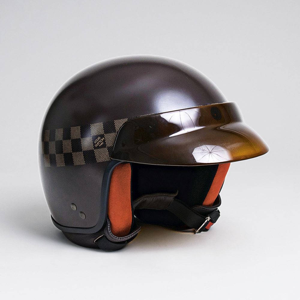 A 'Mini Jet GM' Motorcycle Helmet with Visor