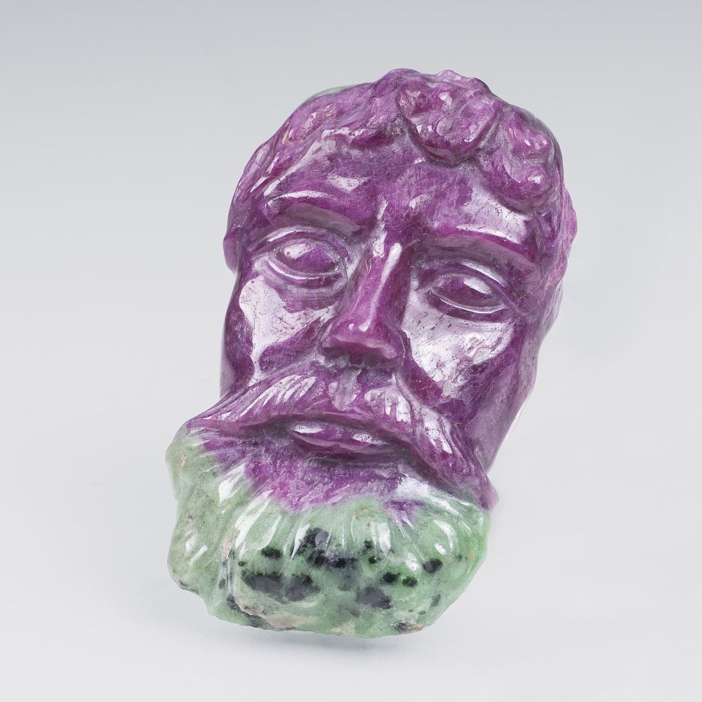 A Ruby Zoisite Stone with carved Image of a Man