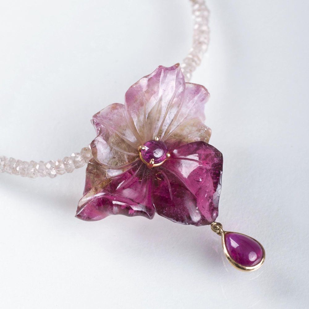 A fine carved Tourmaline Ruby Flower on a Quartz Necklace