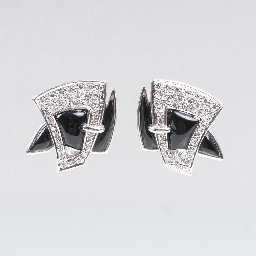 A Pair of Onyx Diamond Earclips