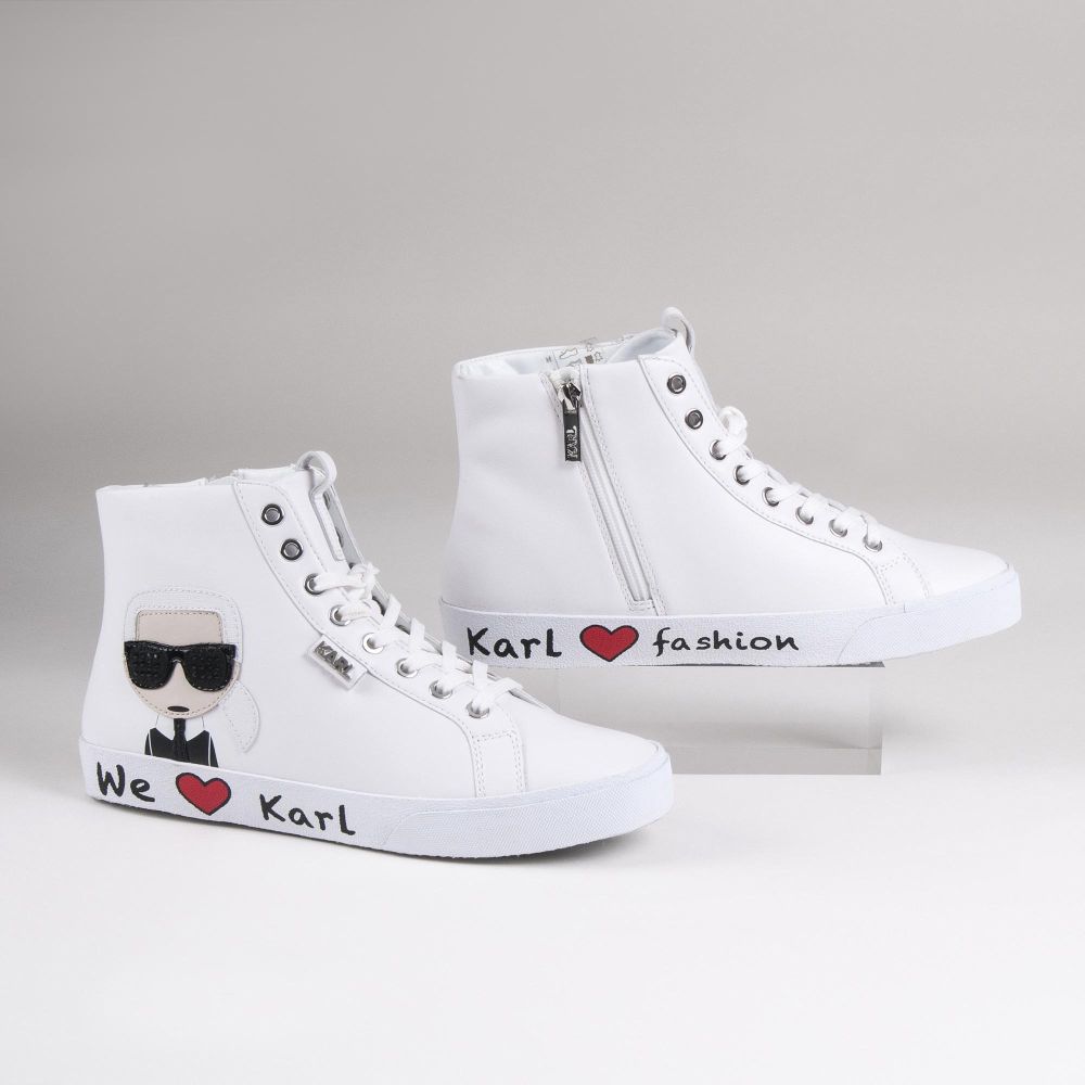 A Pair of Iconic High White Sneakers - image 2
