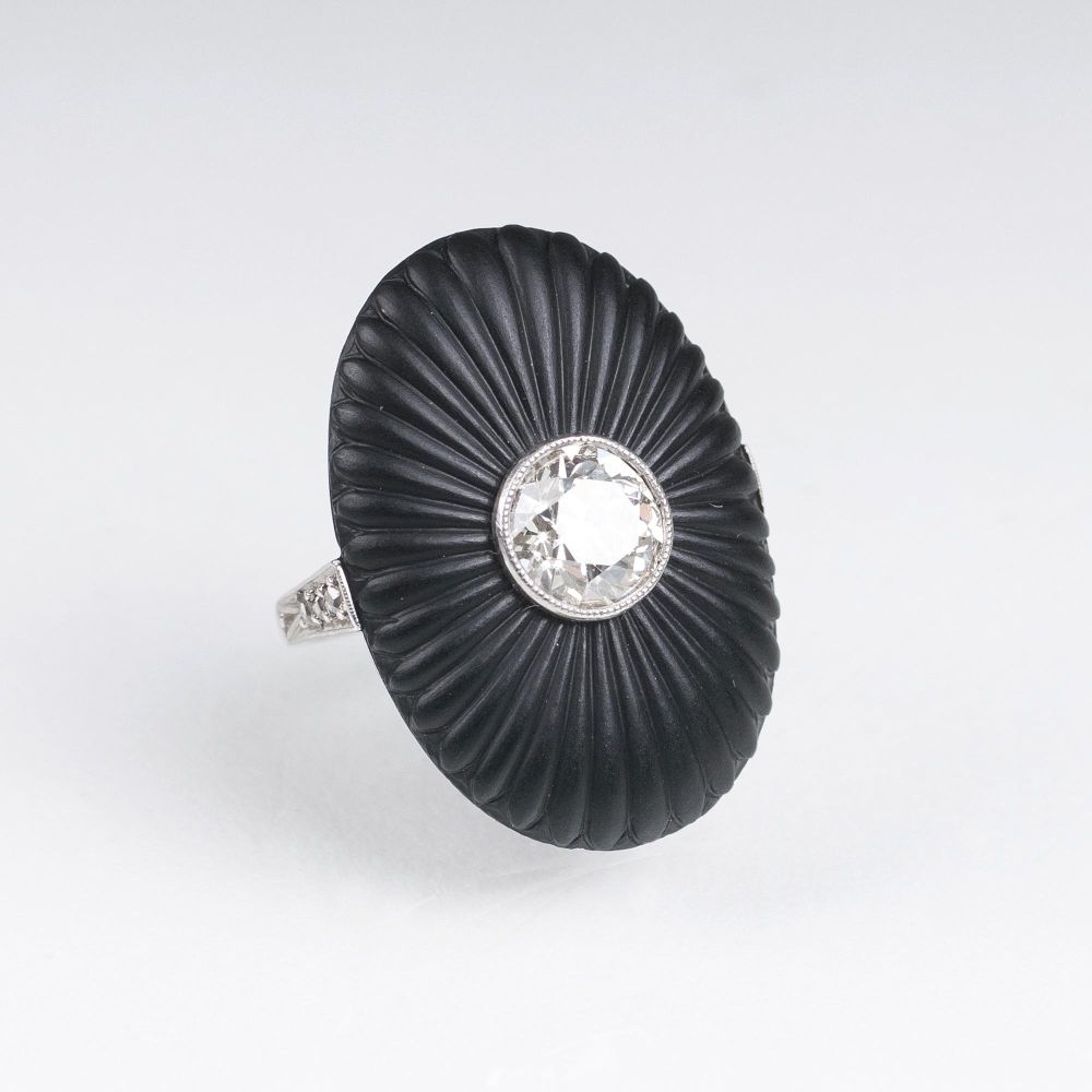 An Art-déco Ring with Old Cut Diamond on Onyx