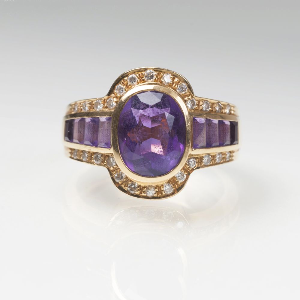 An amethyst diamond ring