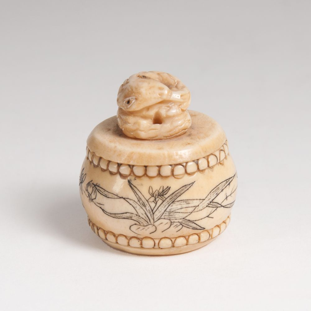 A small Ivory Box with Snake Pommel