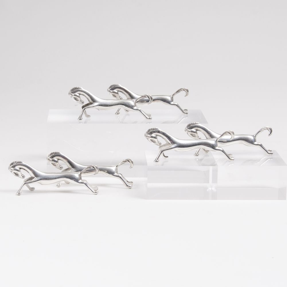 A Set of 6 Horse-Shaped Knife Rests