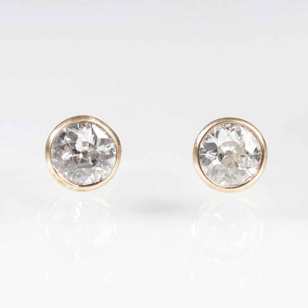 A Pair of Solitaire Earstuds with Old Cut Diamonds