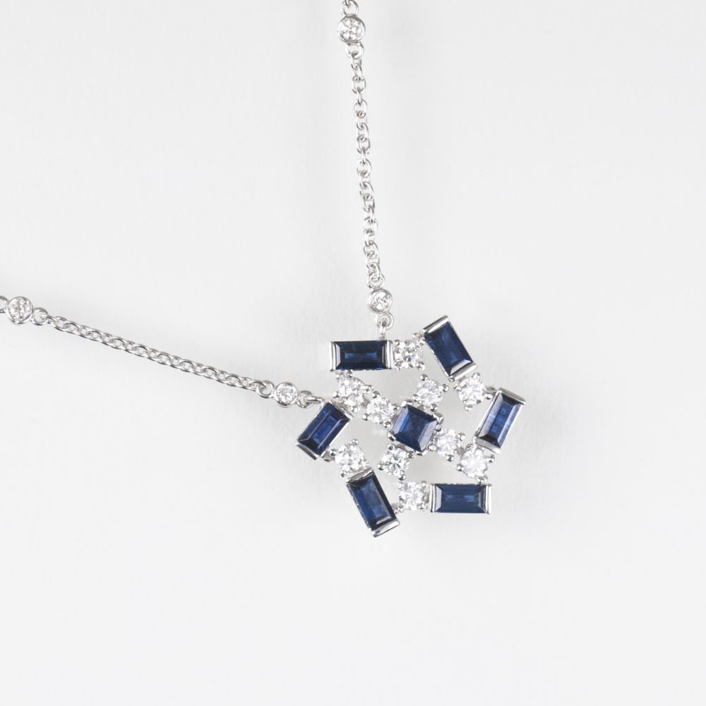 A modern Sapphire Diamond Pendant on Diamond Necklace