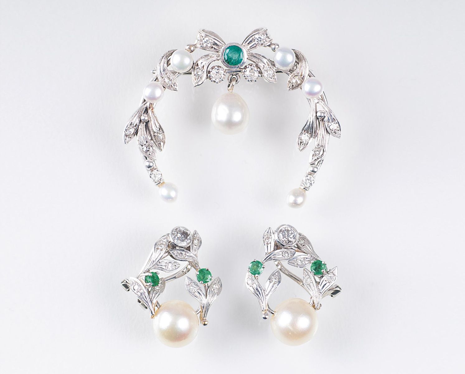 A Diamond Pearl Brooch with matching Pair of Earclips