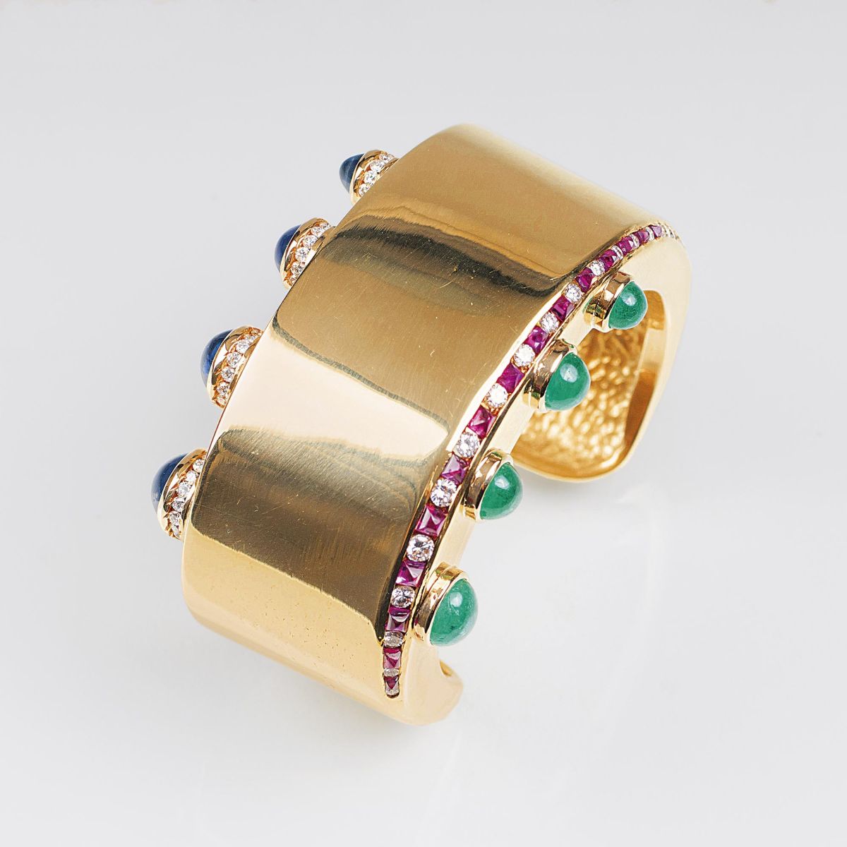 A widie Gold Bangle Bracelet with Precious Gemstone and Diamonds