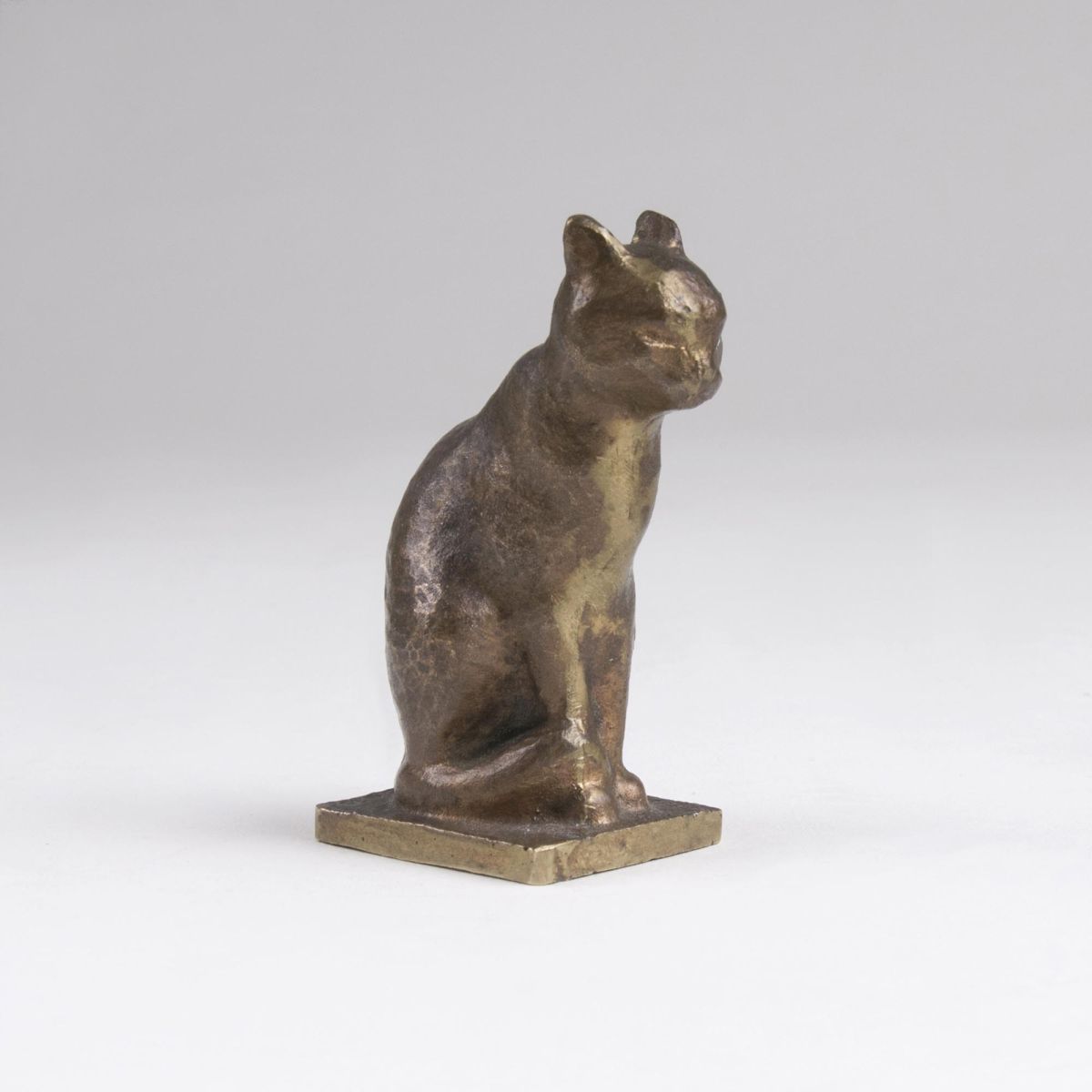 A Small  Animal Bronze 'Seated Cat'