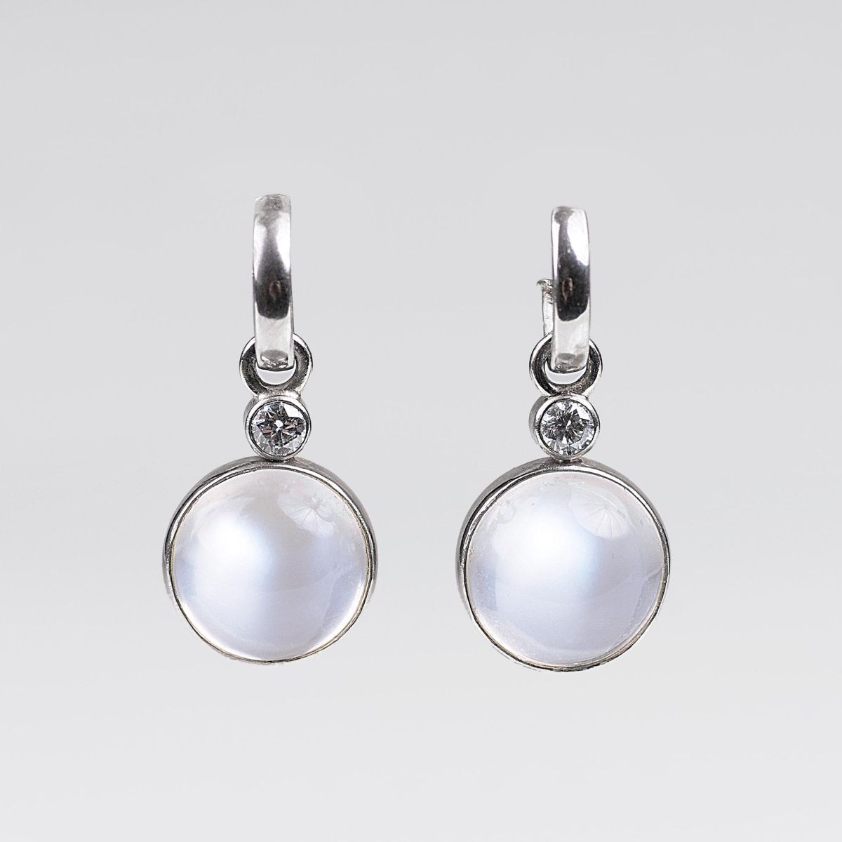 A Pair of Moonstone Diamond Earrings