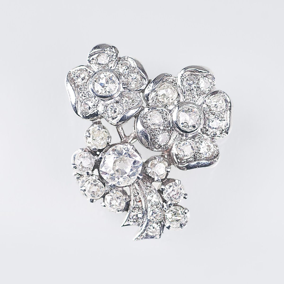 An Antique Flower Brooch with Old Cut Diamonds