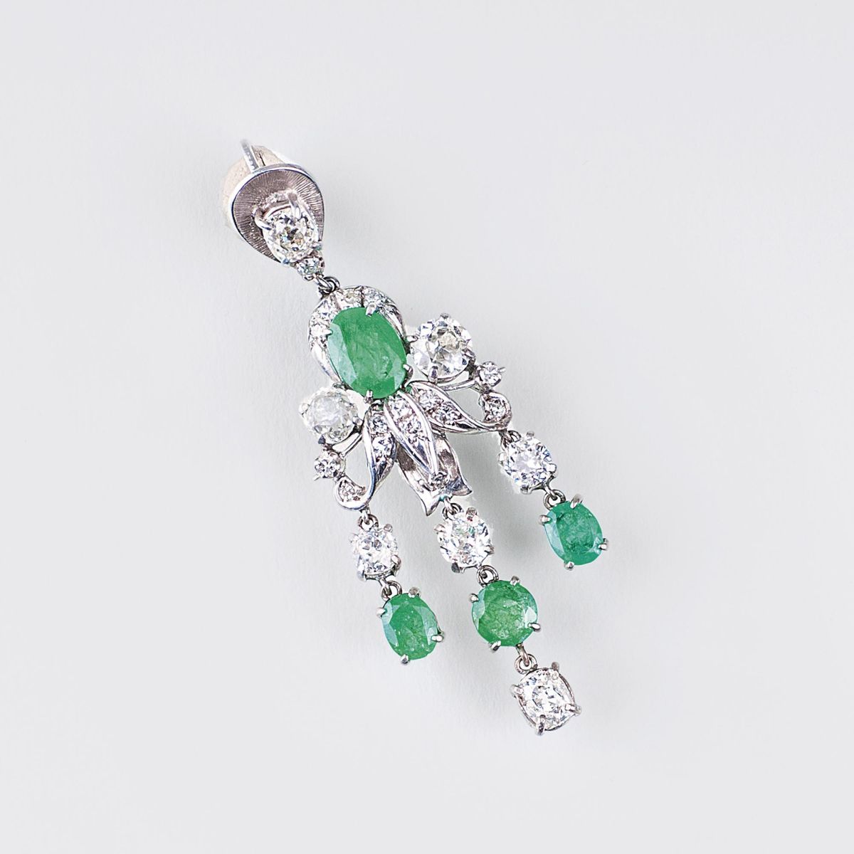 An Emerald Pendant with Old Cut Diamonds