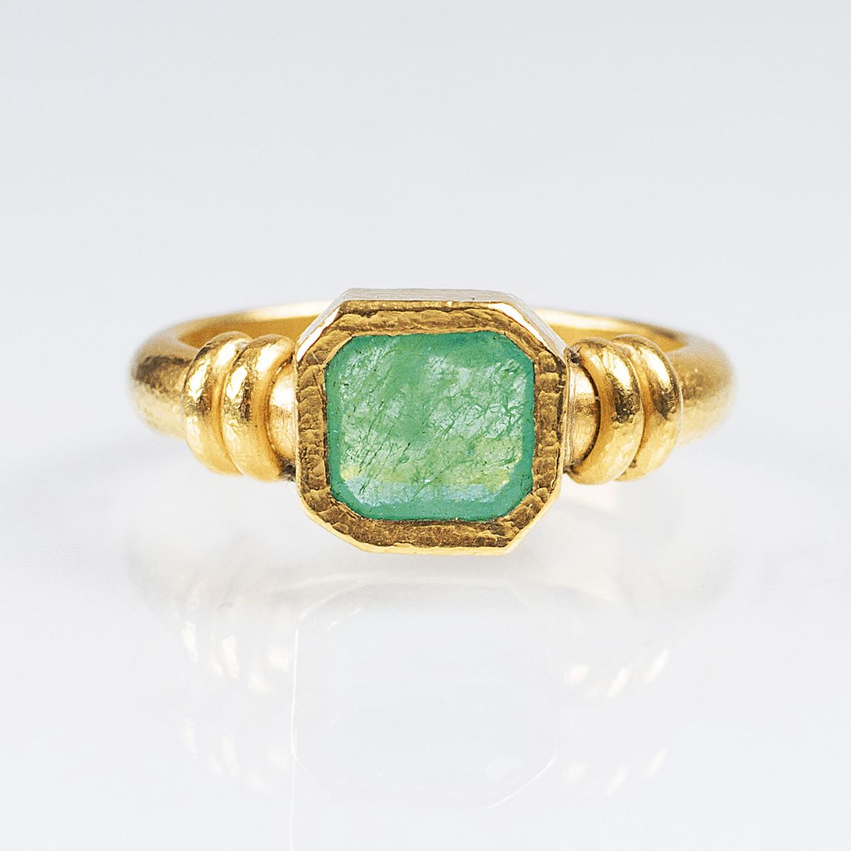 A Gold Ring with Emerald by Armin Haase