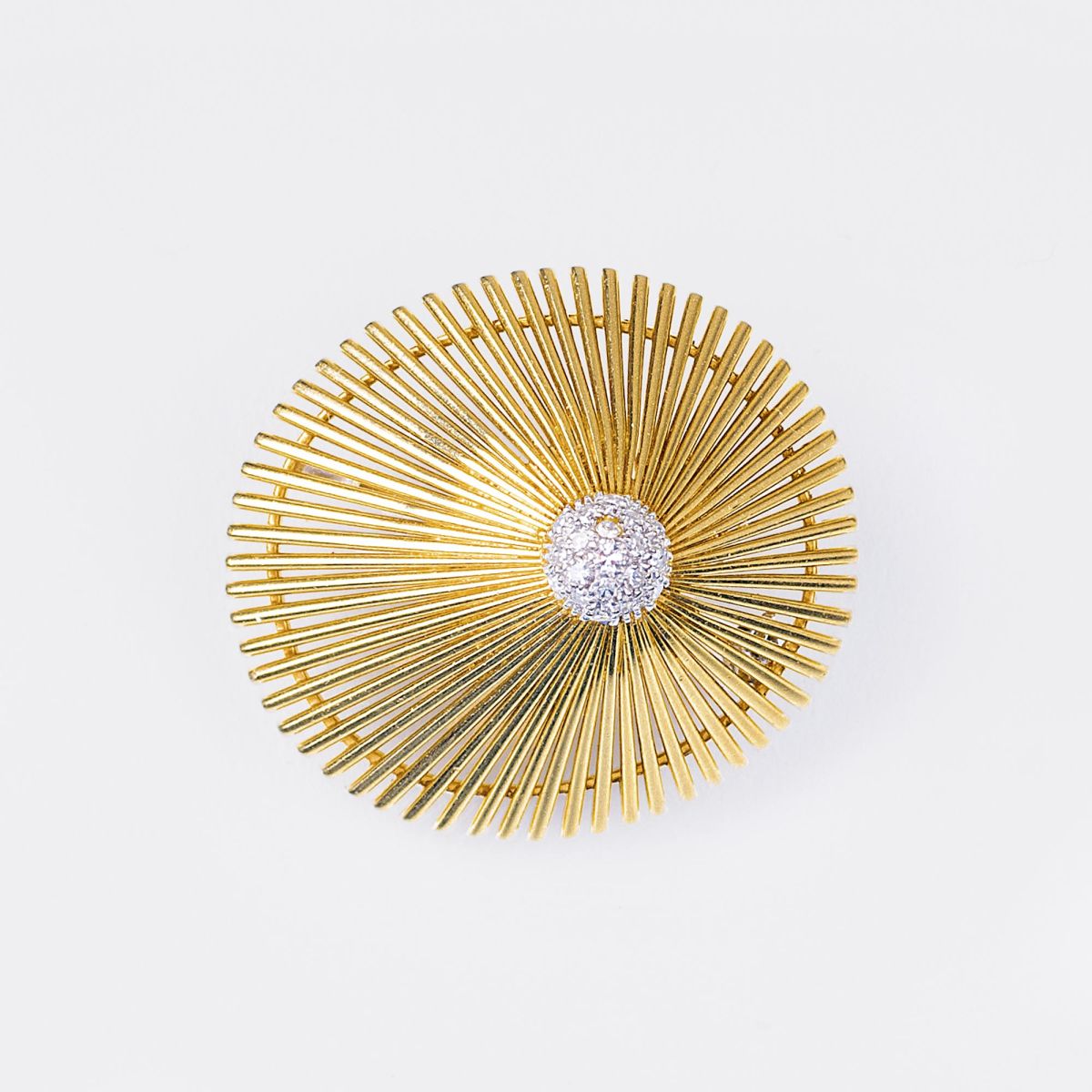 A Vintage Gold Brooch with Diamonds