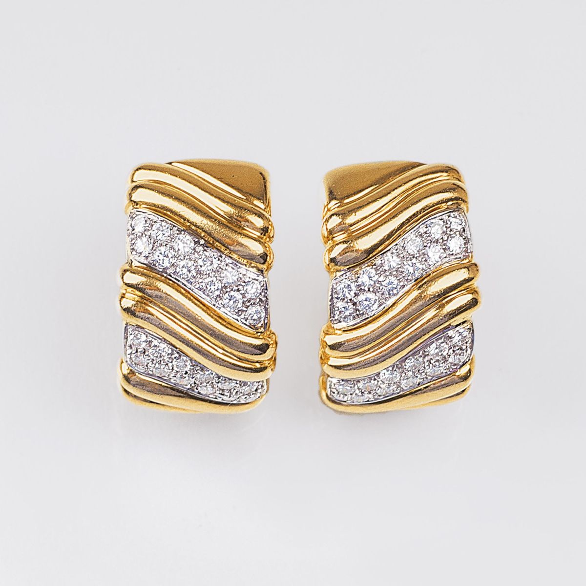 A Pair of Diamond Earrings