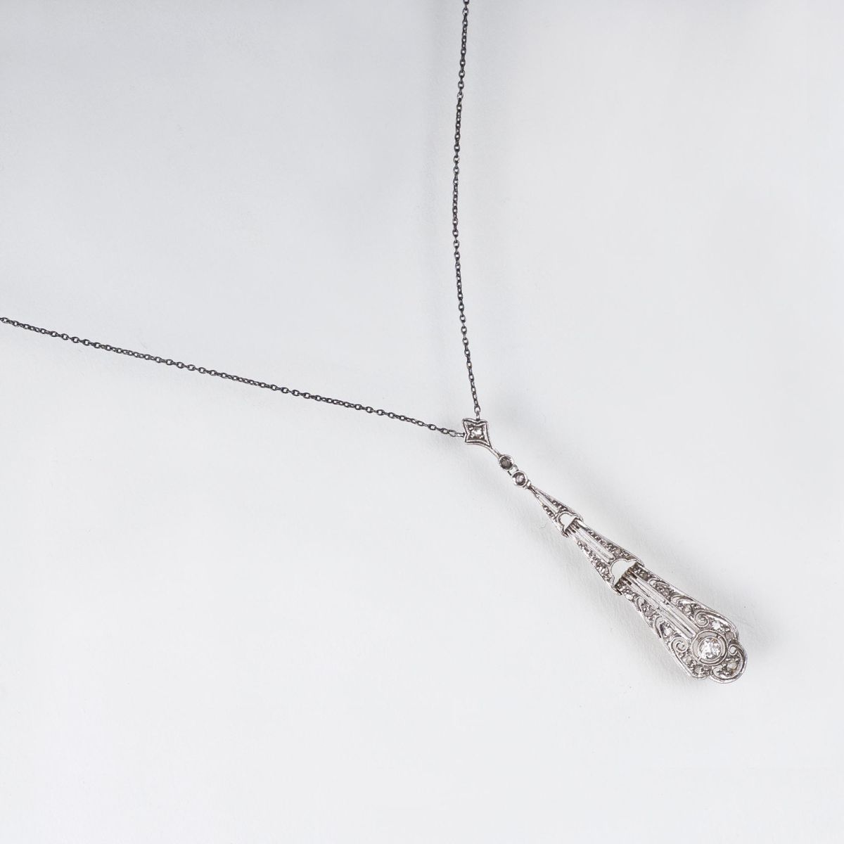 A petite Art Nouveau Diamond Pendant on Necklace