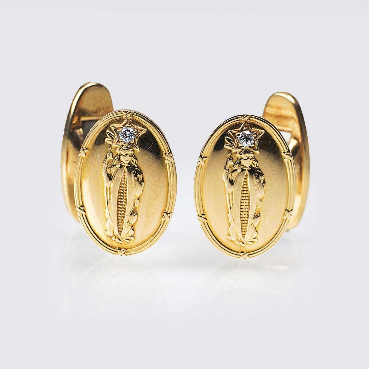 A Pair of Cufflinks with motives of a Native Indian
