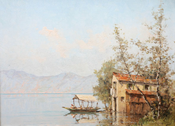 Fischerhaus und Boot am Ufer des Lago Maggiore