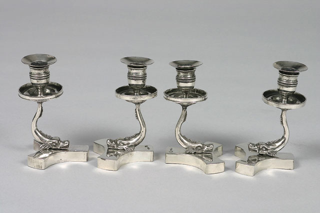 A set of 4 extraordinary candle holders