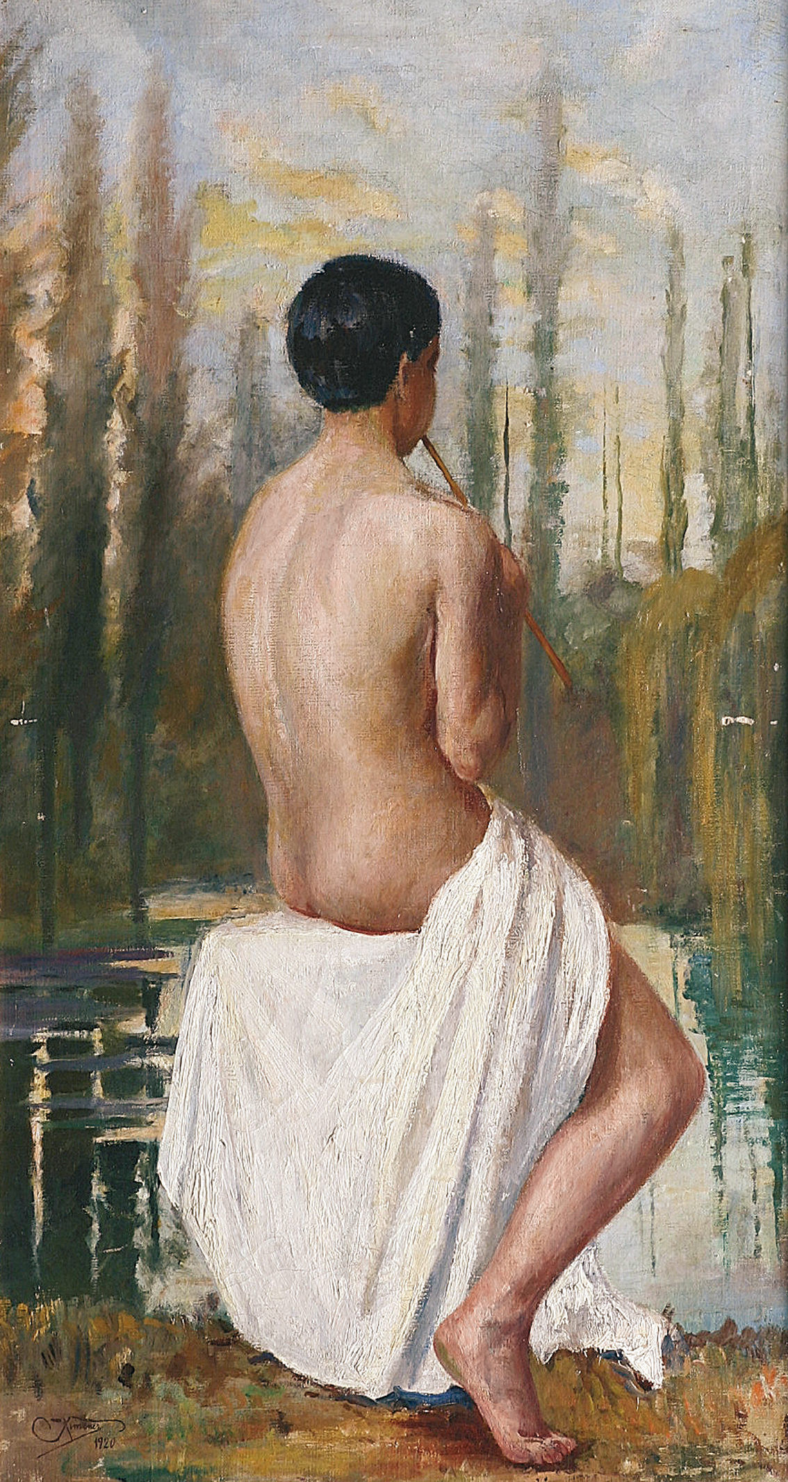 A youth with a flute at a pond in a park